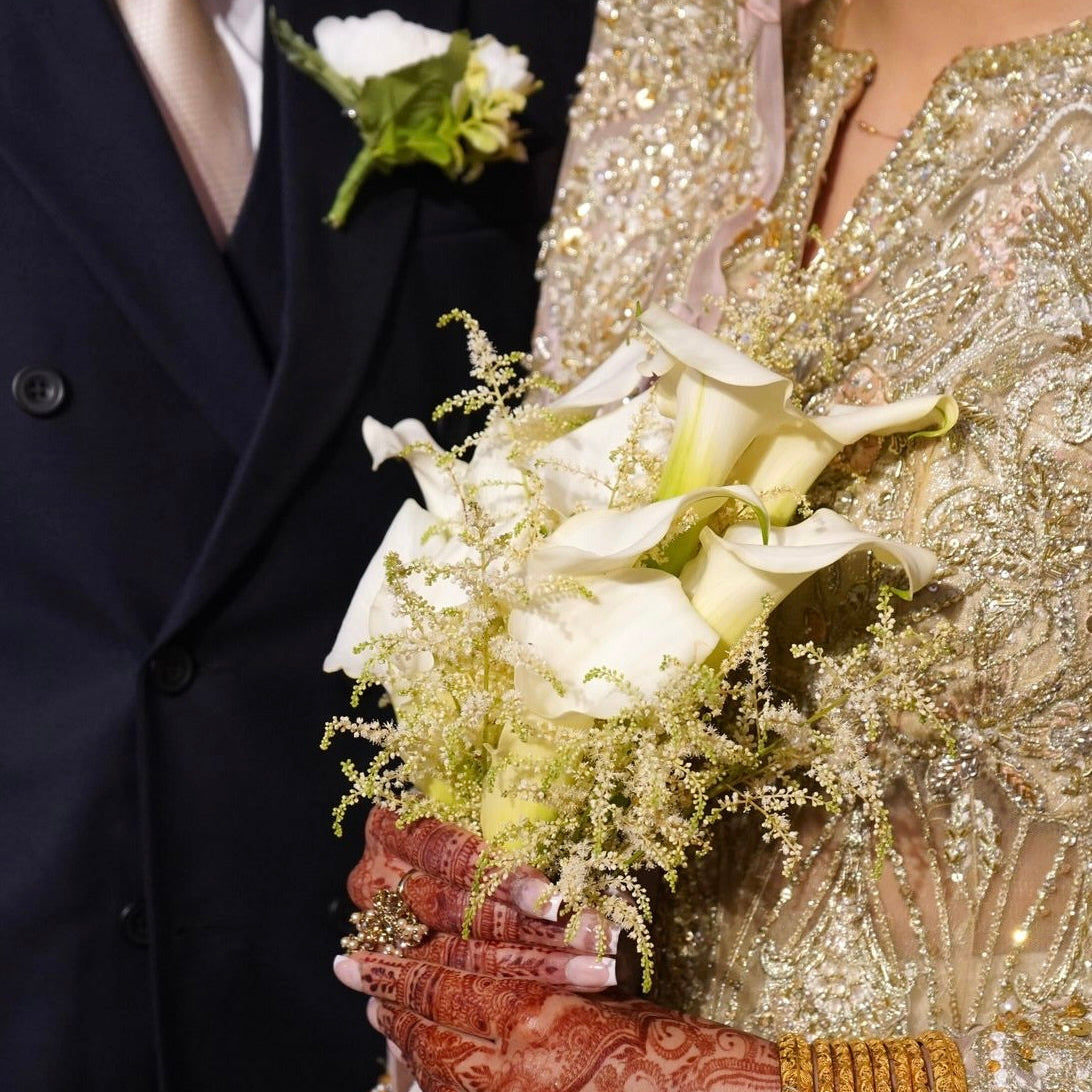 Bridal lily bouquet and boutenniere
